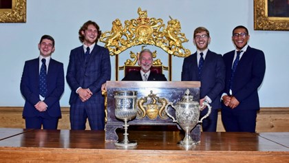 Competitors with the master and draw cups